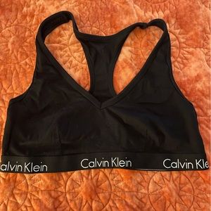 Calvin Klein seamless unlined racerback Sports Bra - Size M